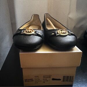 Michael Kors Black Leather Loafers with Gold Accents